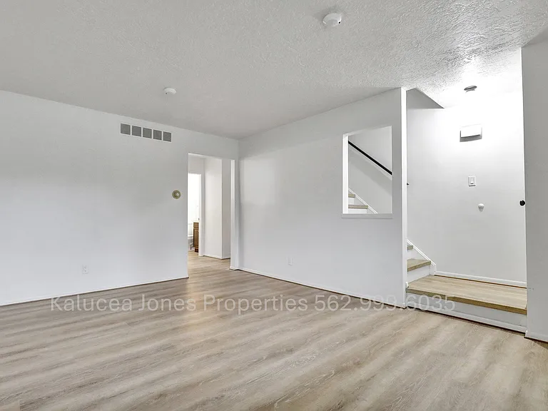 Living room facing stairs