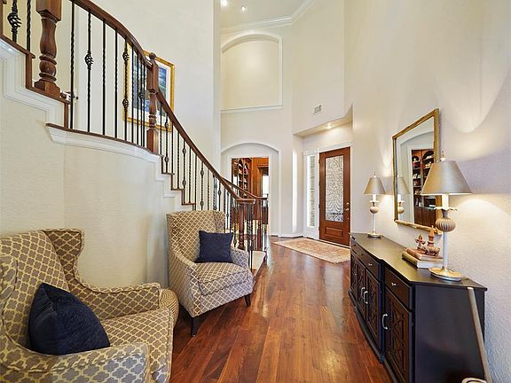 This is a shot from the other end of the entry where you can see the beautiful leaded glass door and the study in the background.