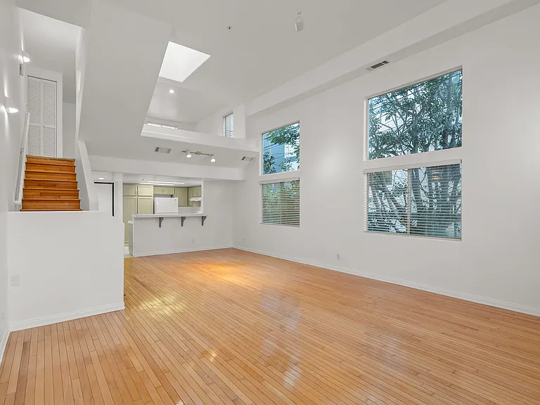 Hardwood floors up to the loft on the second level.