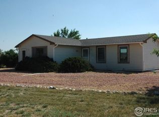 18740 Rawhide Flats Rd, Wellington, CO 80549