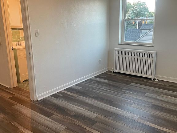 Bedroom looking into hall toward bath