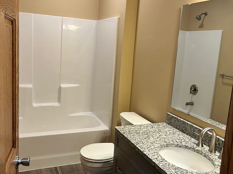 Second full bath on main level with tub/shower