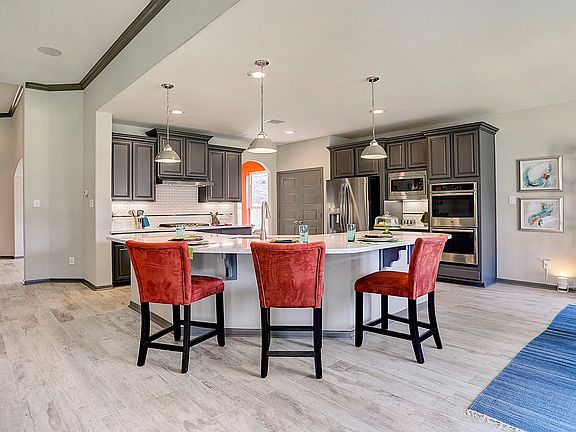 Kitchen with curved island