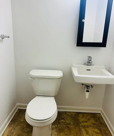 1/2 BATH ON LOWER LEVEL