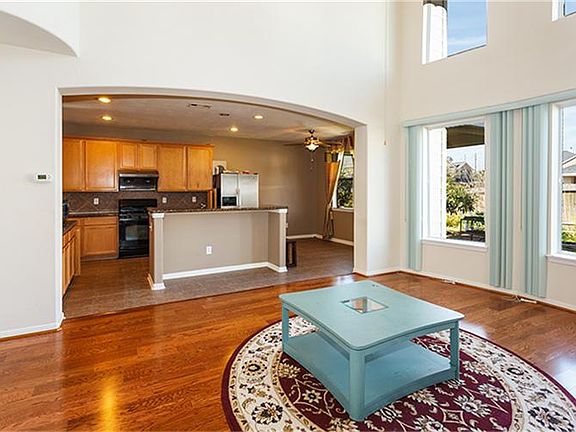 The Den boasts 18' ceilings