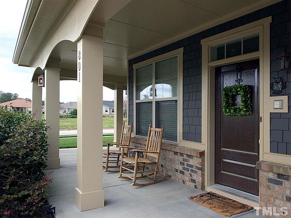 Relax on the beautiful wrap-around porch. Home is on a corner lot.