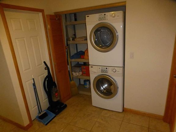 Full size front loading washer/dryer.