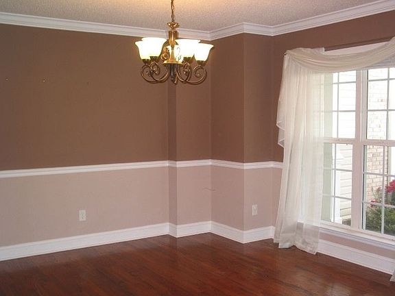 Formal dining room with hardwood floors