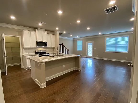 Kitchen and living room.