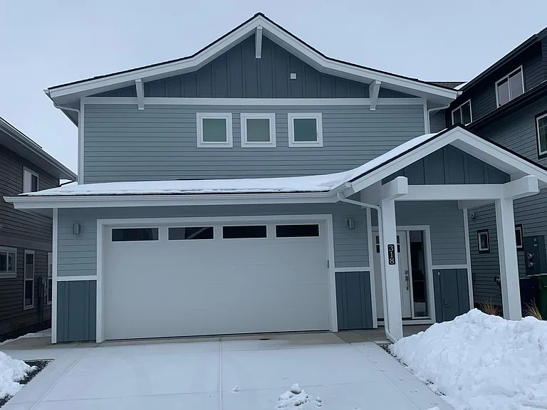 Front of house, 2 car garage