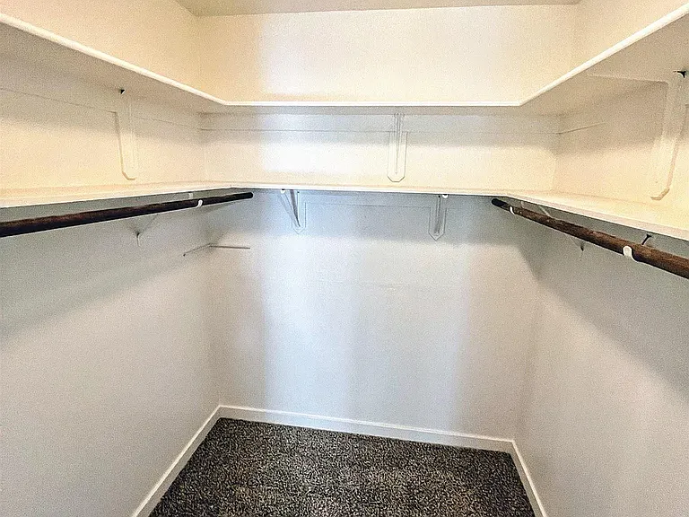 Walk-in closet in master bedroom