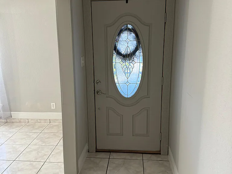 Greet your guest with beautiful entry hallway open to the large family room.