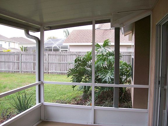 Large Fenced Backyard and Screen Lanai