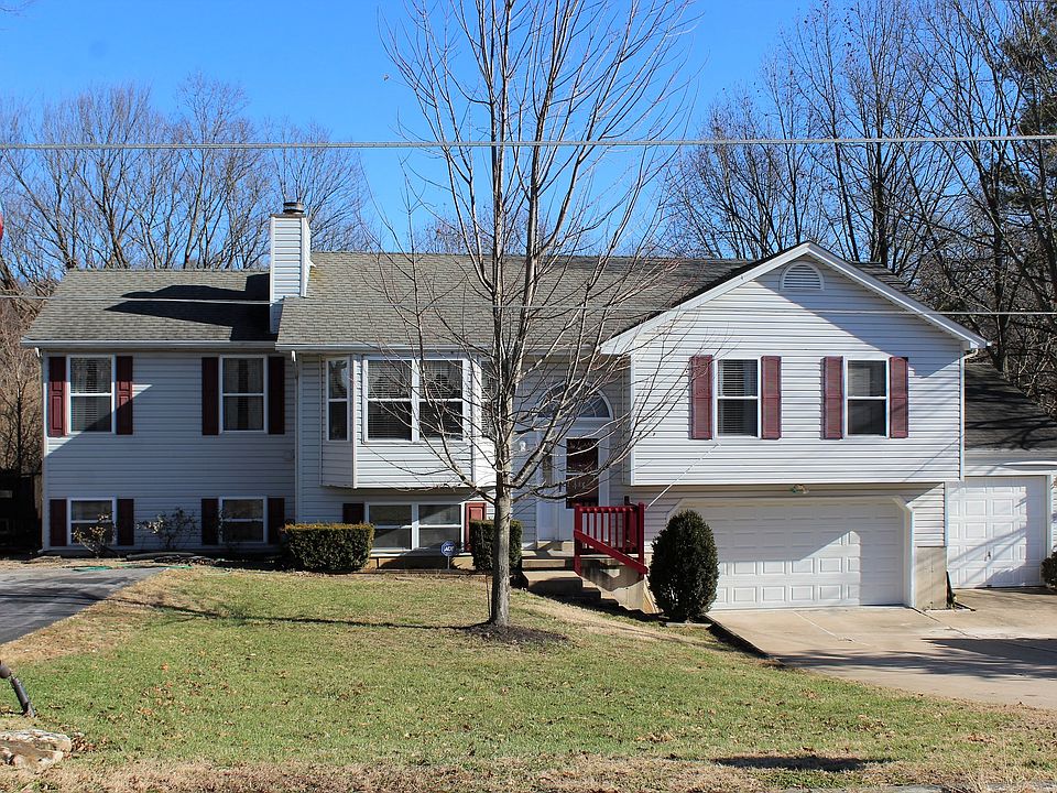 3 Car Garage + Extr Driveway