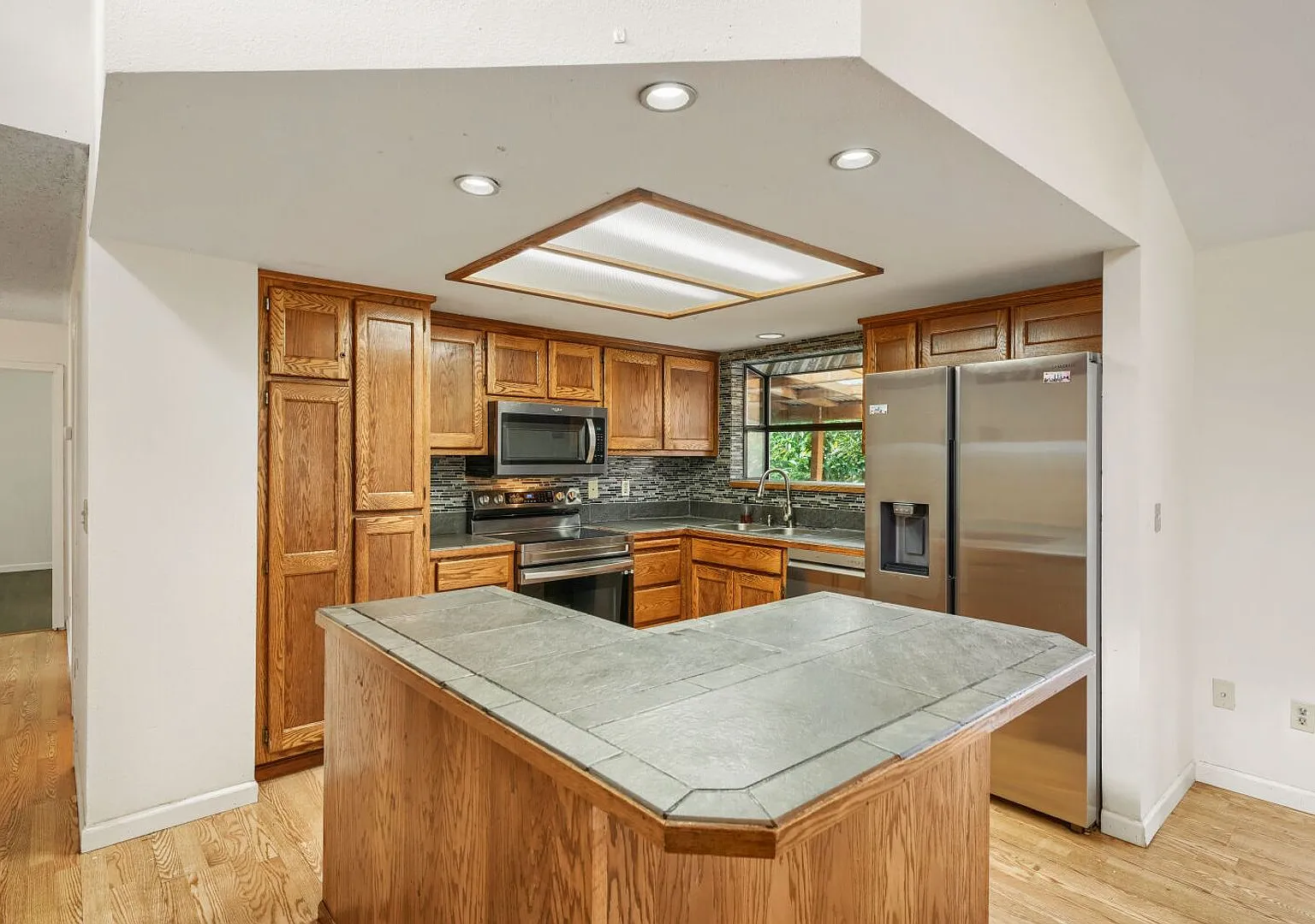 3-bed/2.5-bath Tri-Level Home on Lea Hill! — Photo 3
