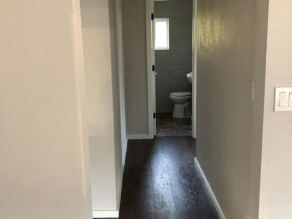 Hallway to 2 bedrooms & bathroom