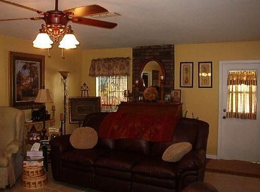 Open living with ceramic tile.