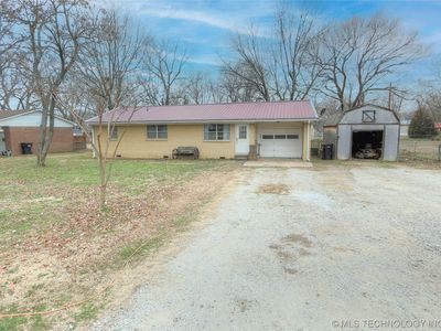 235 S Locust St, Oologah, OK, 74053