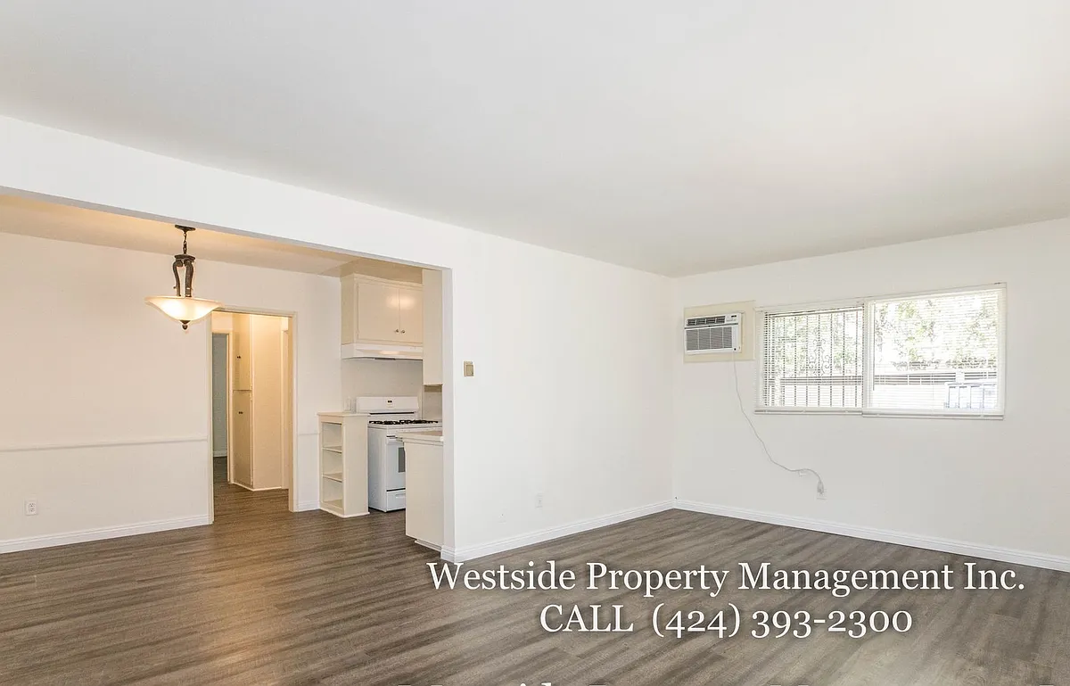 Building Photo - 145 N La Peer Dr #4