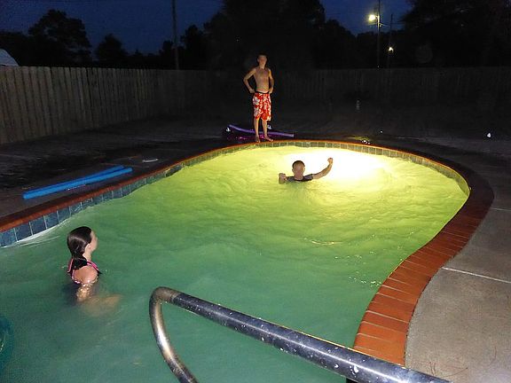 night time pool fun