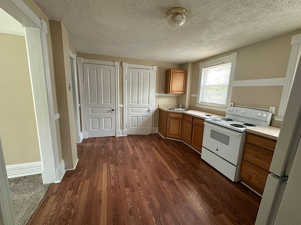 Large kitchen with room for breakfast nook, large pantry and door to bathroom shown.