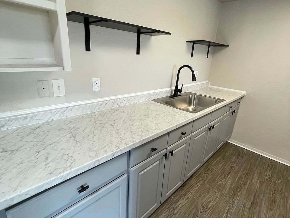 kitchen sink and cabinet storage