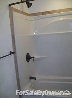 Shower/tub with tile around edge