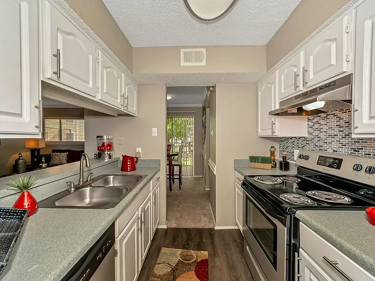 Modern kitchen layout with open access to dining area