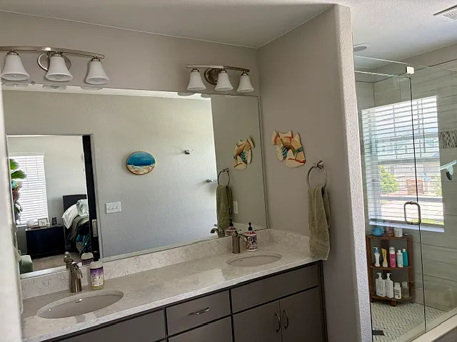 Primary bath with double vanity and rainshower