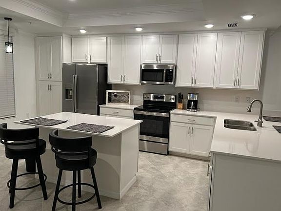 Kitchen/Snack Bar Featuring State of the Art Featuring all New GE Appliances. Includes Dishwasher and Garbage Disposal