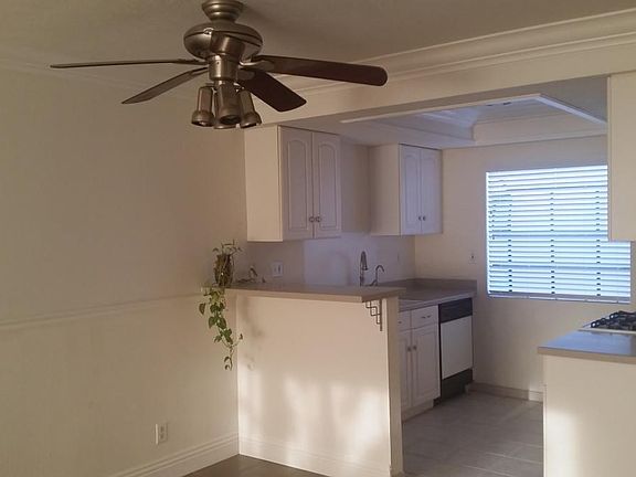 Kitchen with a bay window.