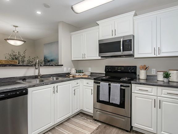 Embrace a sleek stainless-steel appliance package, elevating your culinary space with sophisticated design and functionality.