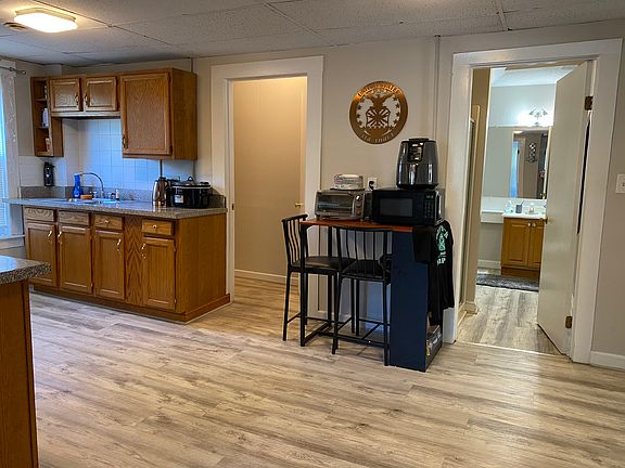 Kitchen, door to mudroom on left and bathroom on right
