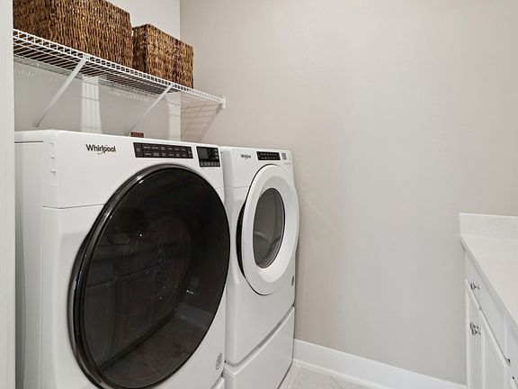Main Level Laundry Room with Optional Cabinets for Storage