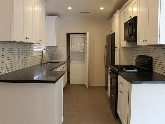 Kitchen (with washer dryer combo in back)