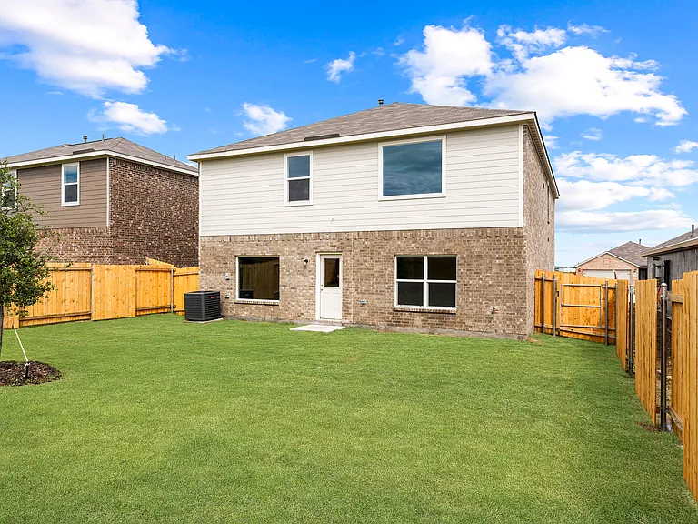 The back yard of the Driftwood is large and fully fenced-in.