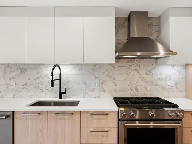 deep sink with black matte faucet