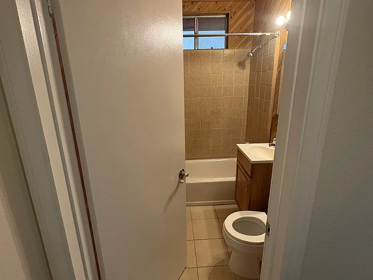 Full bathroom at end of hall