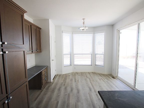 Dining Area with Walk-in Pantry - Slider Access To Patio