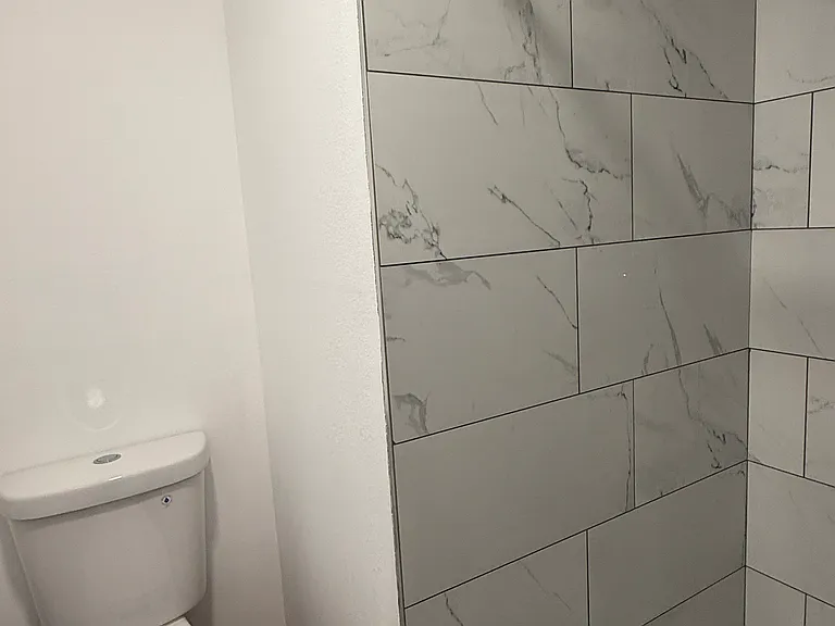 Private Bathroom with Shower _ Bedroom 2