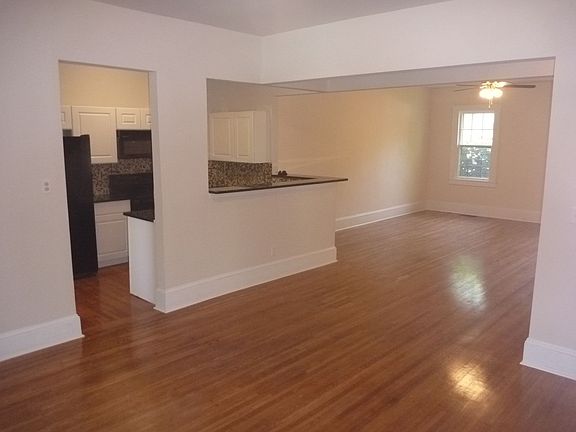 open dining and living area with kitchen