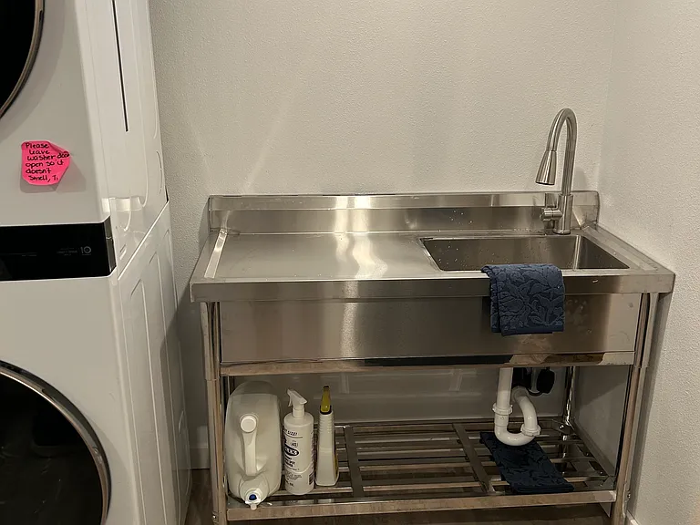 Stainless steel sink for light cleaning. You can put your dishes in the dishwasher on the main level.