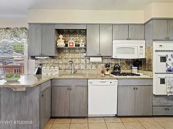 5th image of 6621 N Hiawatha Ave