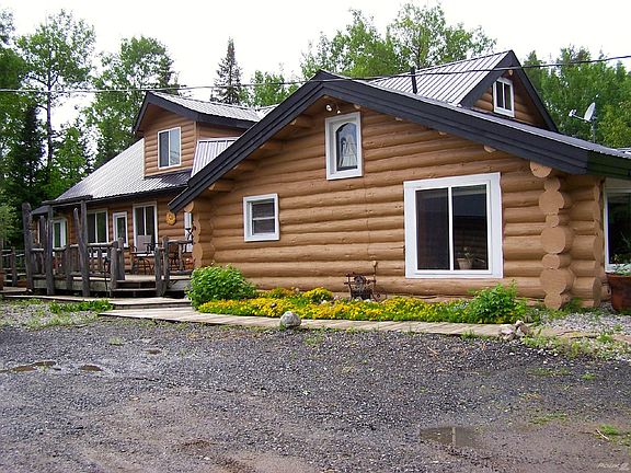 Keeler ext side w flowers