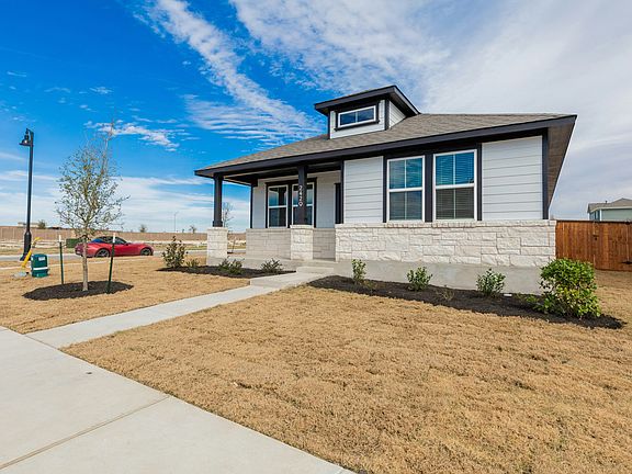 This home is located on a spacious corner lot.