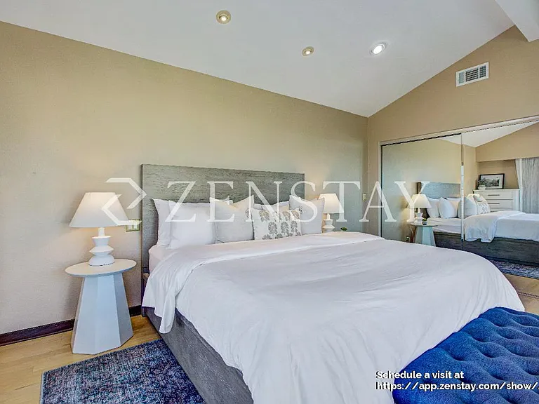 Comfortable bedroom with queen bed and inviting layout