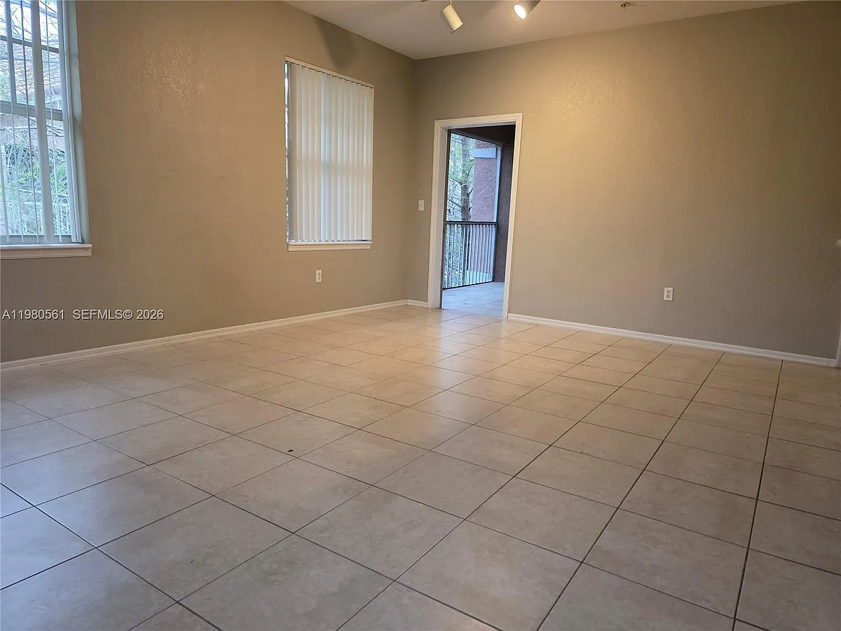 Building Photo - 6660 W Sample Rd #6660