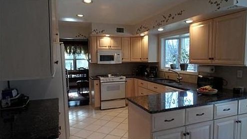 Kitchen work area with lots of granite