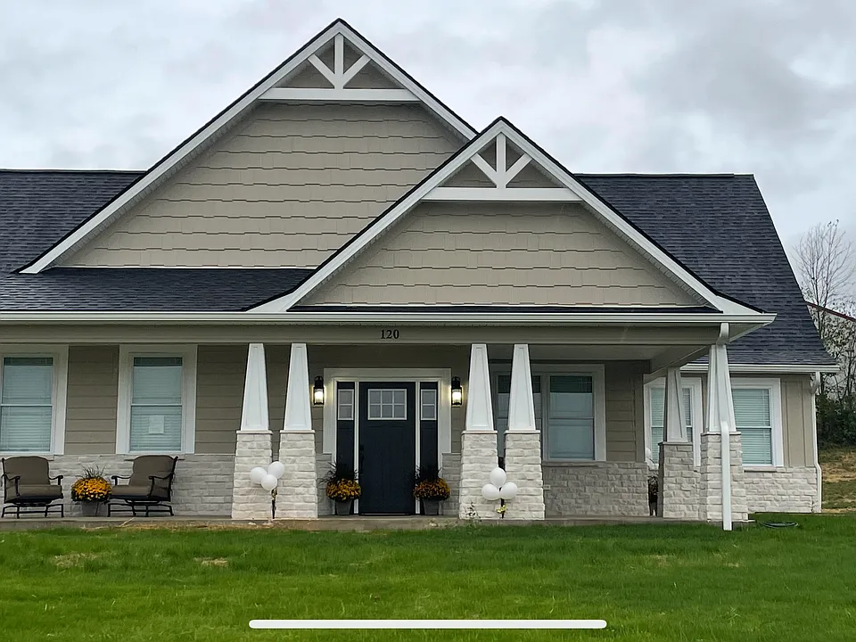 Large front porch with eating area. oversized garage single car garage with own private driveway