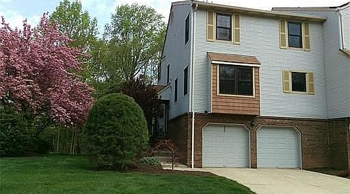 Front with 2 car garage